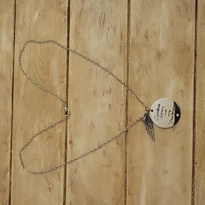 Necklace with a 20" chain.